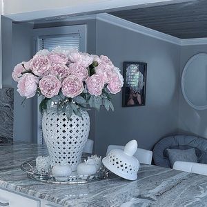 white ceramic vase. For any corner of the home.